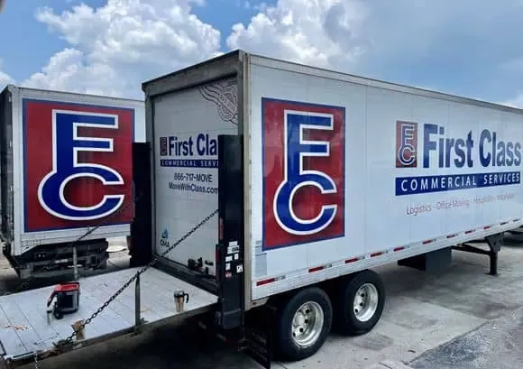 First Class Commercial Services trailer with the FC logo